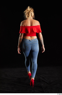 Daisy Lee 1 back view blue jeans dressed red high…